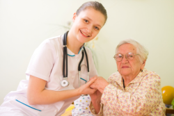 nurse taking care of an elderly person
